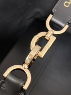 MITTELGROSSE 28 TOUJOURS TASCHE IN SCHWARZ-WEISSEM CANNAGE-TWEED MIT GOLDENEN BESCHLÄGEN