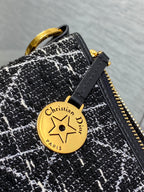 STAR HOBO 28 Tasche mit Kette, Schwarz-Weiß-Cannage-Tweed mit goldenen Beschlägen