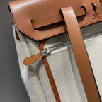 HERBAG A DOS ZIP RETOURNE BACKPACK 29 IN OFF-WHITE CANVAS AND BROWN CALFSKIN