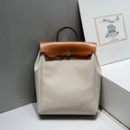 HERBAG A DOS ZIP RETOURNE BACKPACK 29 IN OFF-WHITE CANVAS AND BROWN CALFSKIN