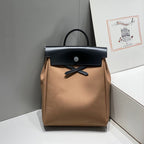 HERBAG A DOS ZIP RETOURNE BACKPACK 29 IN BROWN CANVAS AND BLACK CALFSKIN