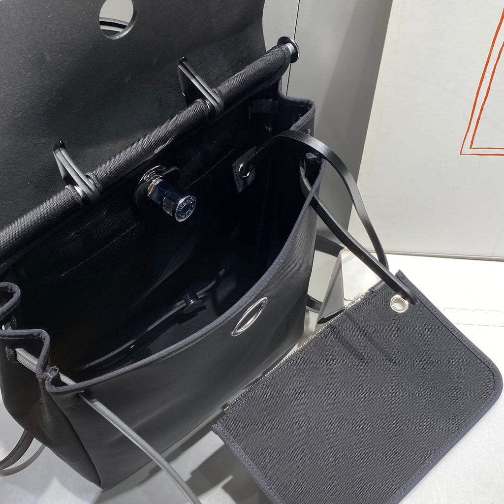 HERBAG A DOS ZIP RETOURNE BACKPACK 29 IN BLACK CANVAS AND CALFSKIN