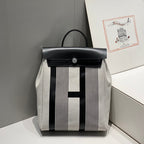 HERBAG A DOS ZIP RETOURNE BACKPACK 29 IN OFF-WHITE MIX BLACK CANVAS AND CALFSKIN