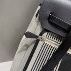 HERBAG A DOS ZIP RETOURNE BACKPACK 29 IN OFF-WHITE MIX BLACK CANVAS AND CALFSKIN