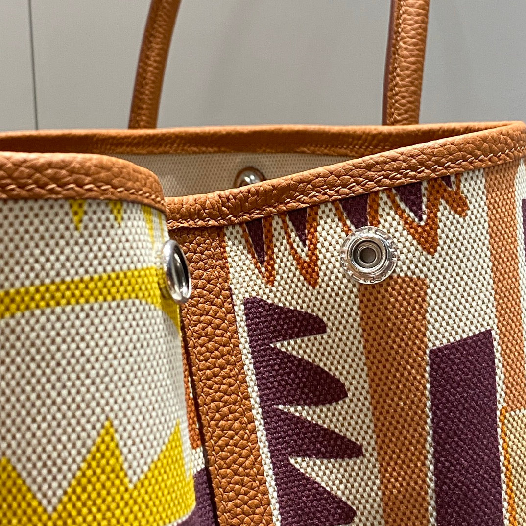 GARDEN PARTY 36 IN MULTICOLOR TOILE H CANVAS GOLD CALFSKIN TROPICAL STREETLINE ILLUSTRATION