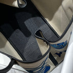 GARDEN PARTY 36 IN BLUE IVORY TOILE H CANVAS BLACK CALFSKIN EQUESTRIAN HARNESS PRINT