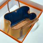 GARDEN PARTY 30CM IN DUNE MAGNOLIA TOILETS COTTON CANVAS AND BROWN CALFSKIN