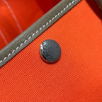 GARDEN PARTY 30CM IN ORANGE MINIMUM TOILETS COTTON CANVAS AND BROWN CALFSKIN