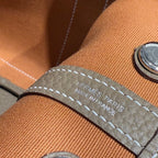 GARDEN PARTY 30CM IN BROWN TOILETS COTTON CANVAS AND TOGO ETOUPE CALFSKIN