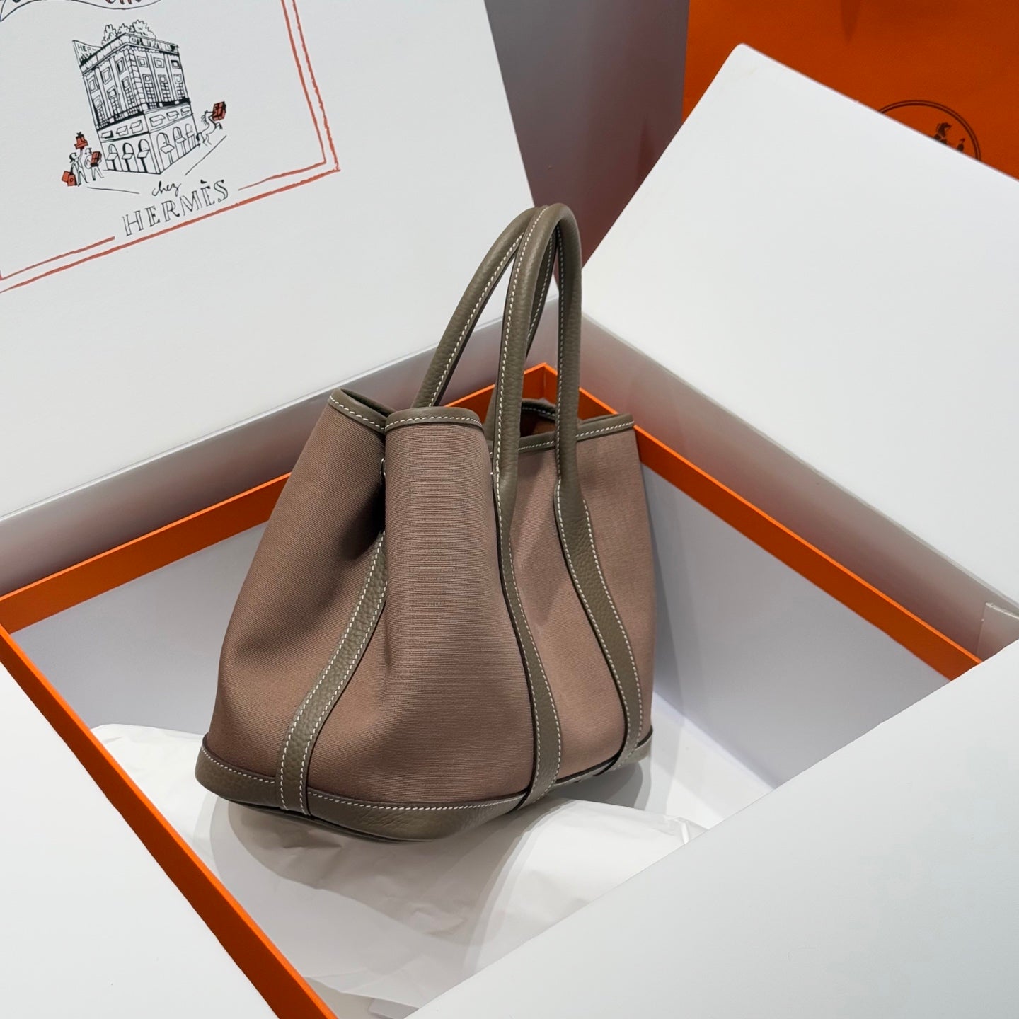 GARDEN PARTY 30CM IN BROWN TOILETS COTTON CANVAS AND TOGO ETOUPE CALFSKIN