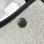 GARDEN PARTY 30CM IN WHITE TOILETS COTTON CANVAS AND BLACK CALFSKIN BLUE CANVAS ON SIDE OTHER