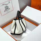 GARDEN PARTY 30CM IN WHITE TOILETS COTTON CANVAS AND BLACK CALFSKIN SKY BLUE CANVAS ON SIDE OTHER