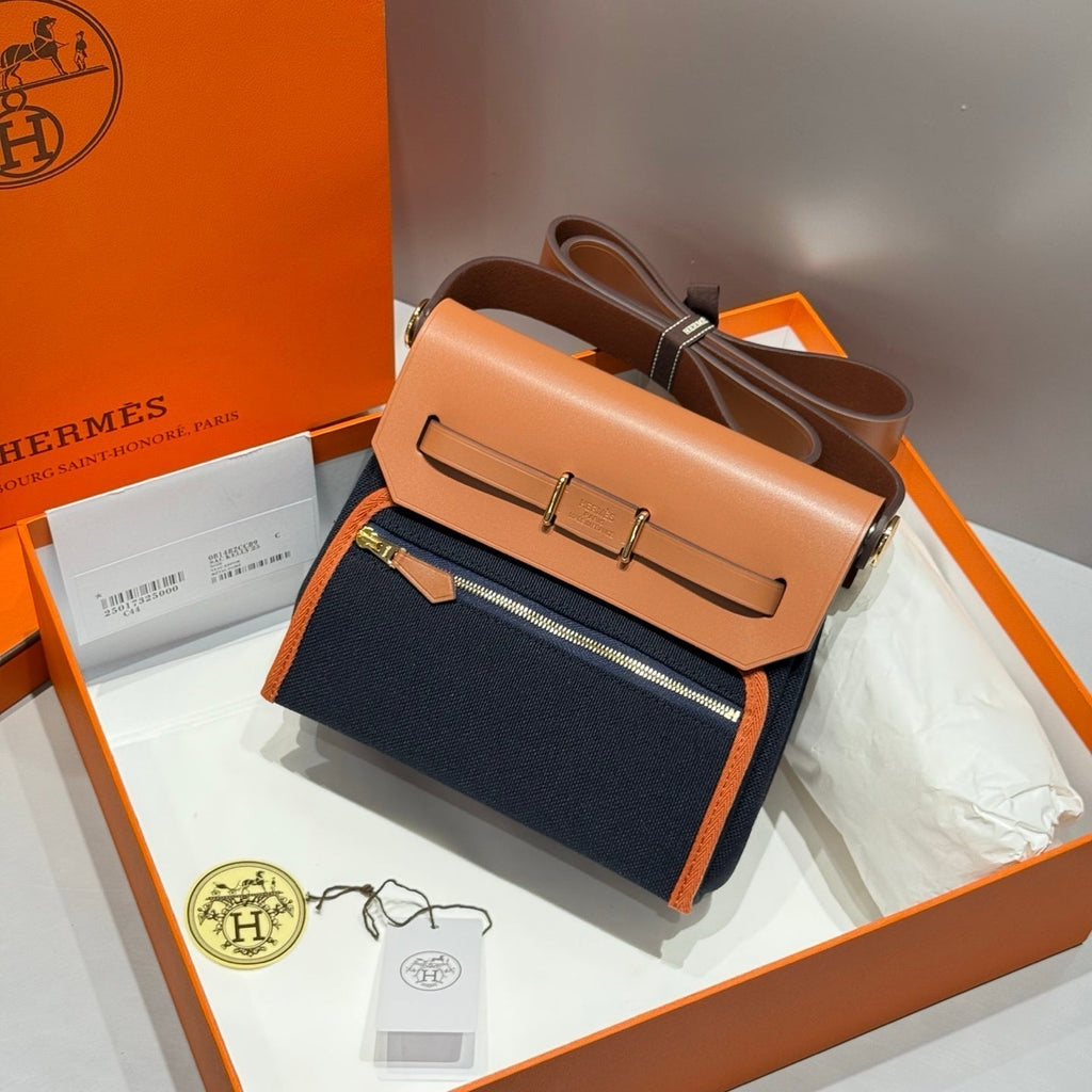 HERMES 25S MINI HERBAG 20 IN NAVY BLUE CANVAS GOLD HARDWARE