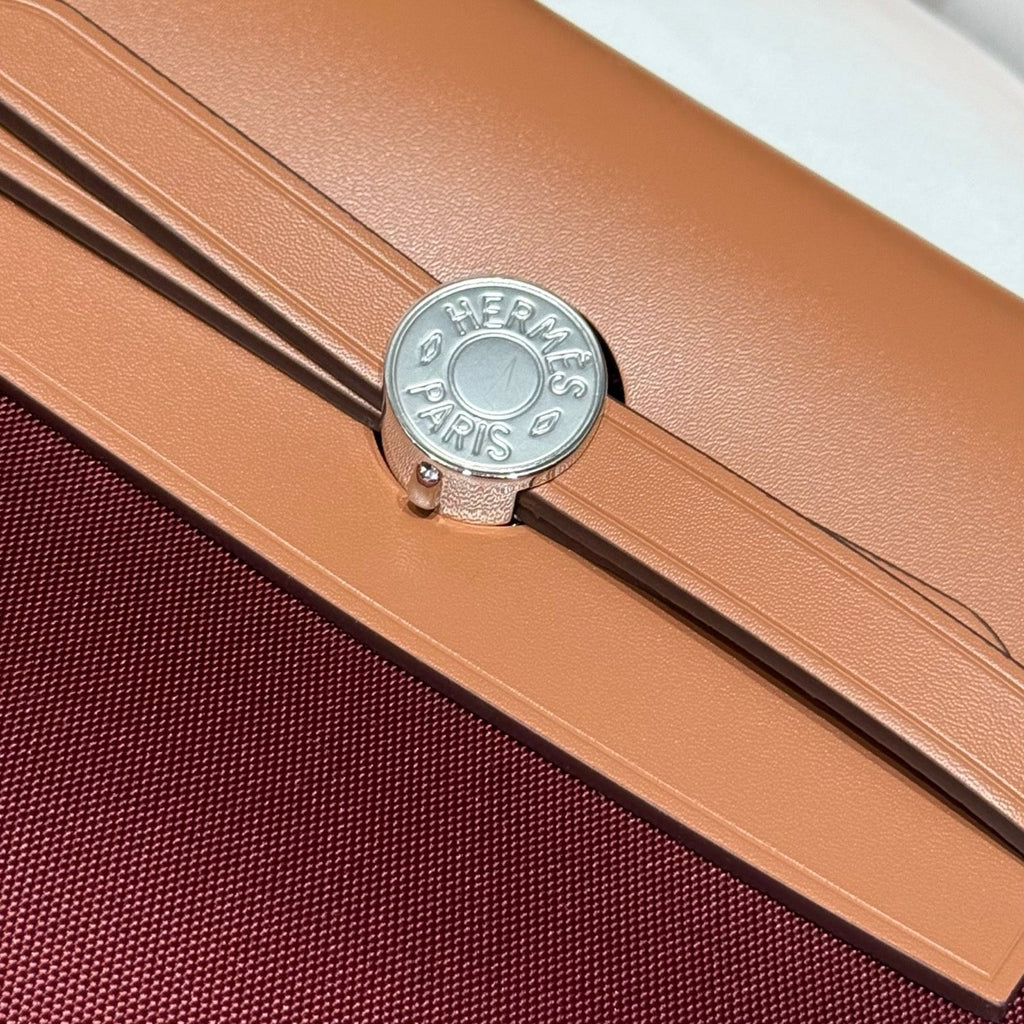 HERMES 25S MINI HERBAG 20 IN PLUM RED CANVAS SILVER HARDWARE