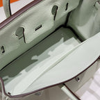 HERMES 25S MEDIUM BIRKIN 25 IN HELLMINTGRÜNEM KALBSLEDER MIT SILBERNEN BESCHLÄGEN