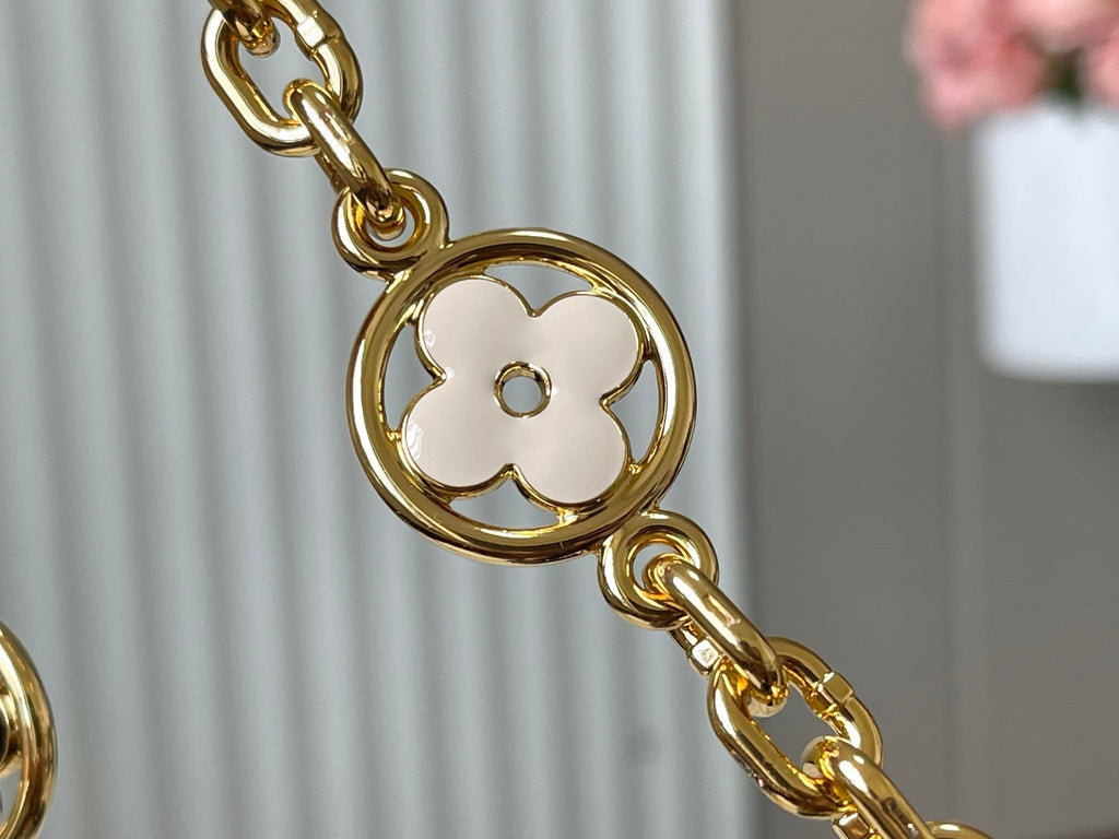 CAPUCINES BB 27 IN SCHWARZ MIX WEISS TAURILLON GOLD HARDWARE