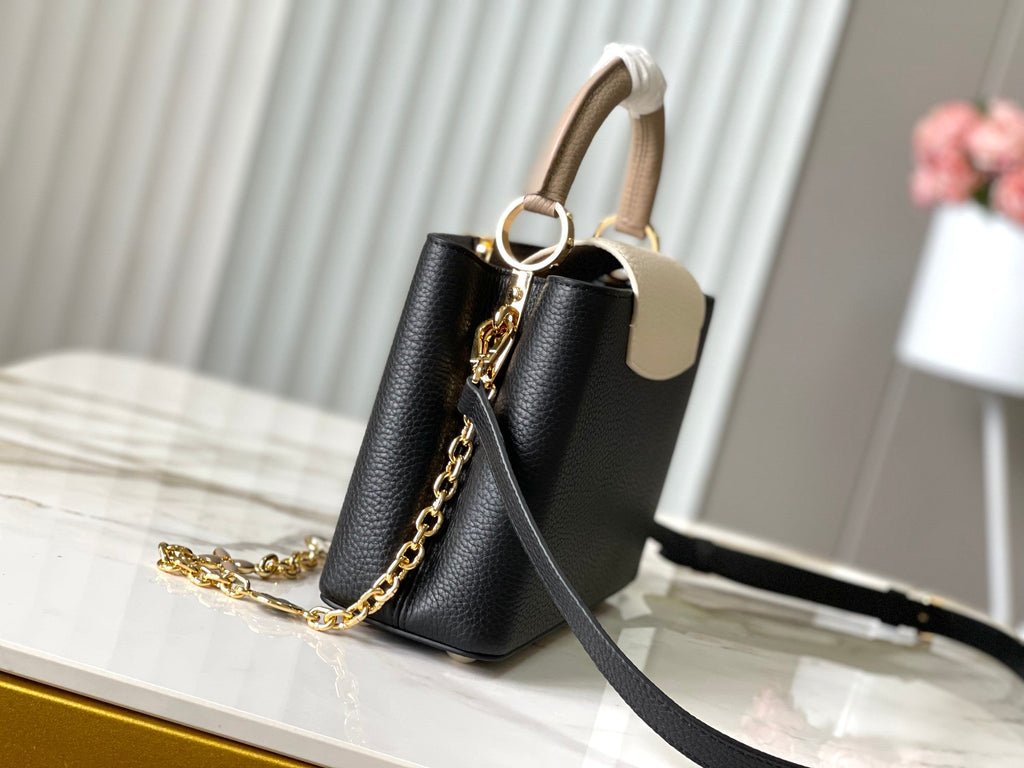 CAPUCINES BB 27 IN SCHWARZ MIX WEISS TAURILLON GOLD HARDWARE