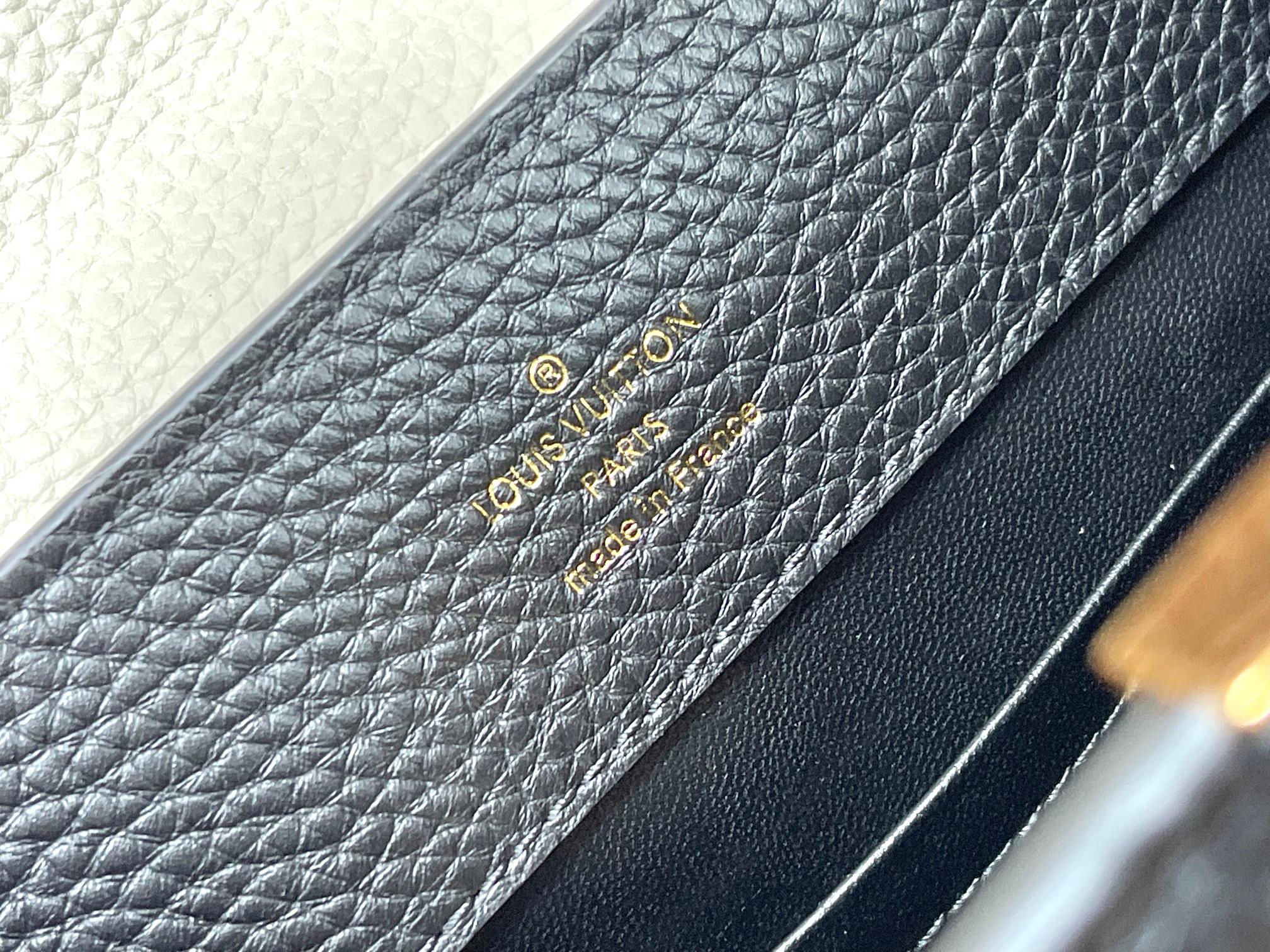 CAPUCINES BB 27 IN SCHWARZ MIX WEISS TAURILLON GOLD HARDWARE