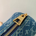 PAPILLON 27 IN BLUE MONOGRAM DENIM GOLD HARDWARE