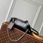 POCHETTE VIBE HANDBAG 25 IN BLACK LAMBSKIN BROWN COWHIDE AND COATED CANVAS TRIM
