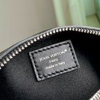 POCHETTE VIBE HANDBAG 25 IN BLACK LAMBSKIN BROWN COWHIDE AND COATED CANVAS TRIM