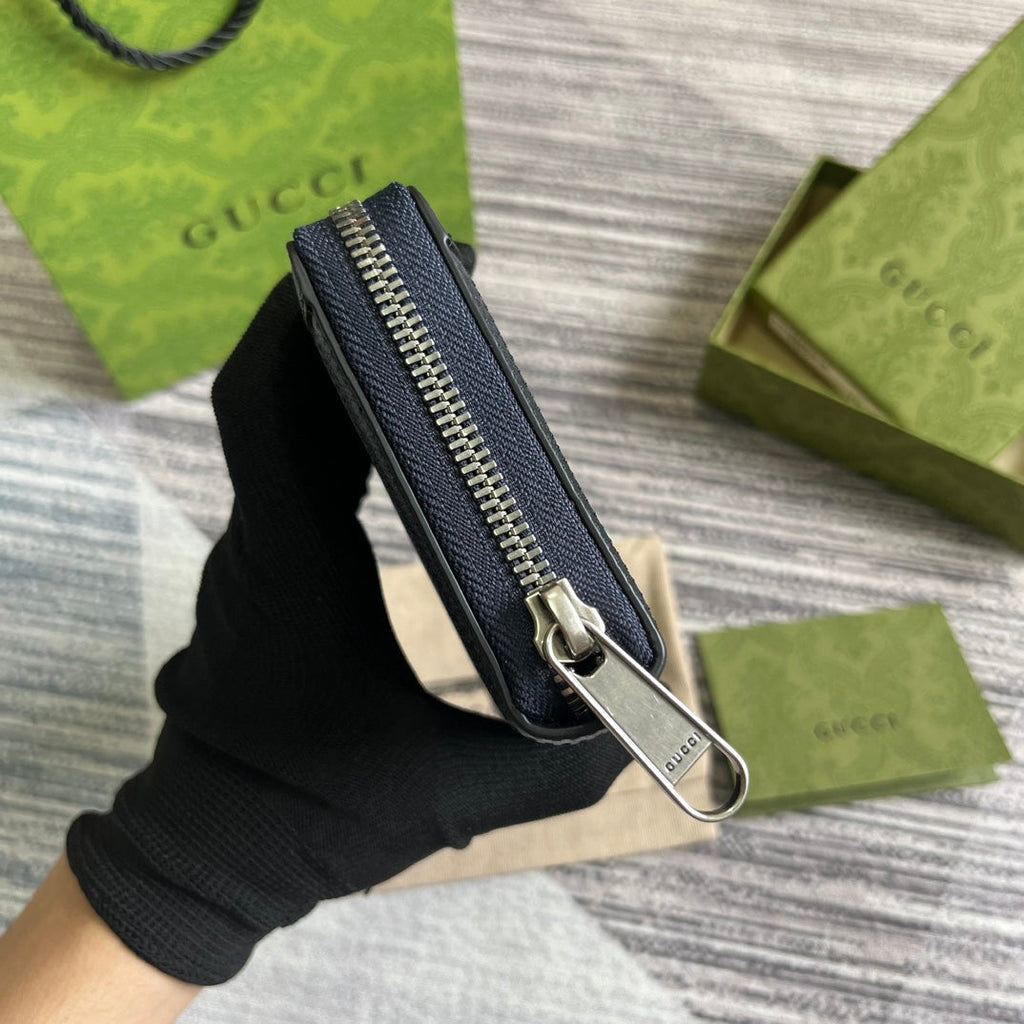 OPHIDIA GG 19 ZIP AROUND GELDBÖRSE DUNKELBLAUES CANVAS UND SCHWARZES KALBSLEDER