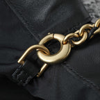 BOTTEGA VENETA 25S Staubbeutel Notte 33 in schwarzem Kalbsleder, goldene Beschläge