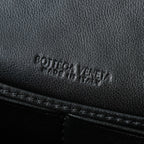 BOTTEGA VENETA 25S ANDIAMO POUCH 19 IN BLACK CALFSKIN GOLD HARDWARE