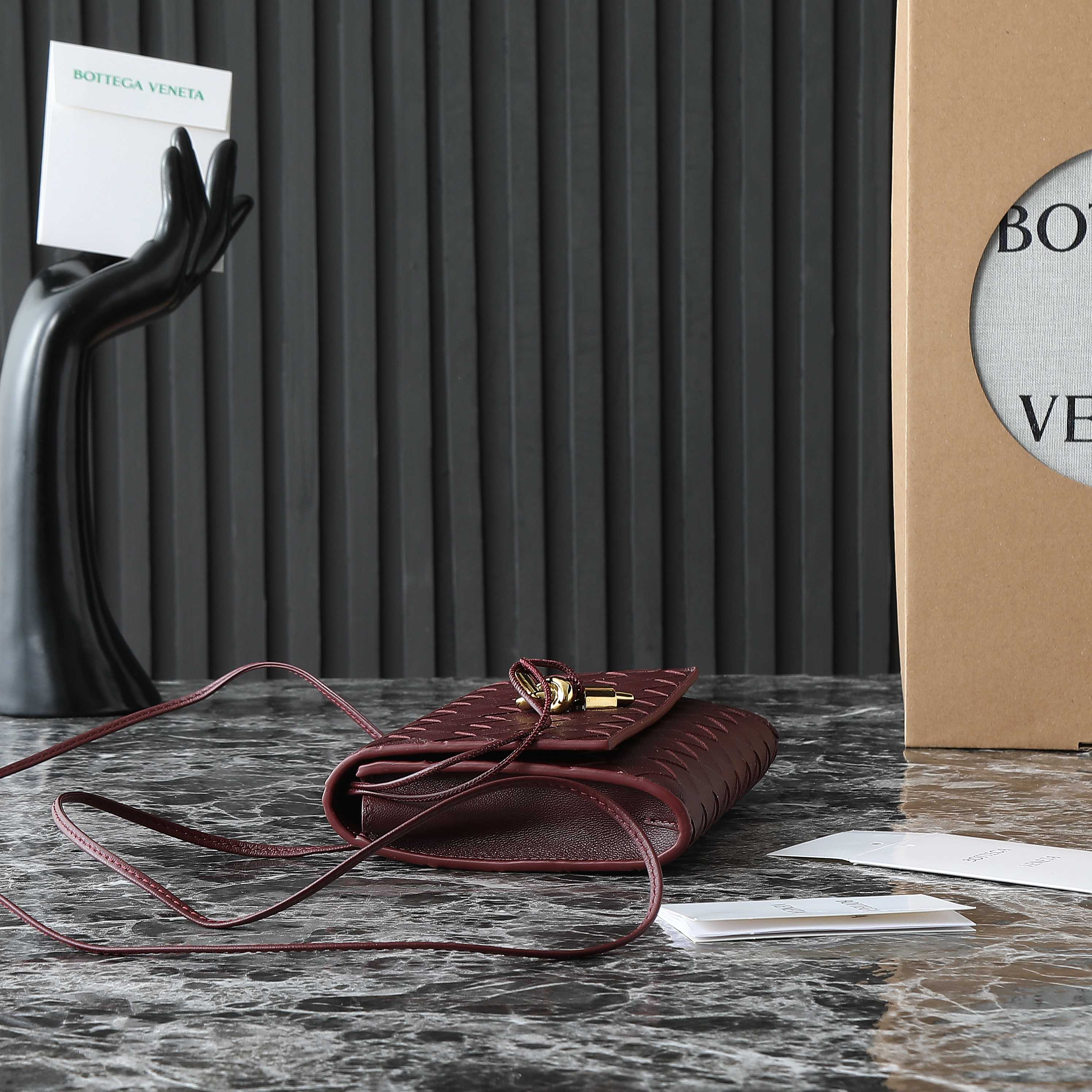 BOTTEGA VENETA 25S ANDIAMO POUCH 19 IN DEEP MAROON KALBSKIN GOLD HARDWARE