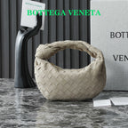 BOTTEGA VENETA 25S MINI JODIE 28 IN MUTED TAUPE SUEDE GOLD HARDWARE