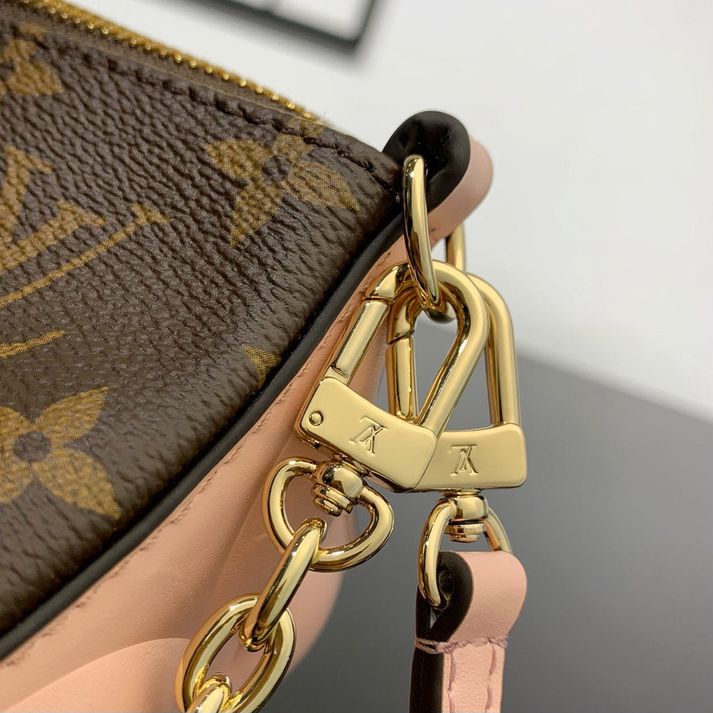 BLOOM POUCH 22 AUS BRAUNEM MONOGRAMM-CANVAS UND SEITEN AUS PASTELROSEM KALBSLEDER