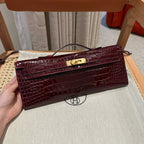 KELLY CUT 31 IN SANGRIA PURPLE ALLIGATOR LEATHER WITH GOLD HARDWARE (MADE-TO-ODER)