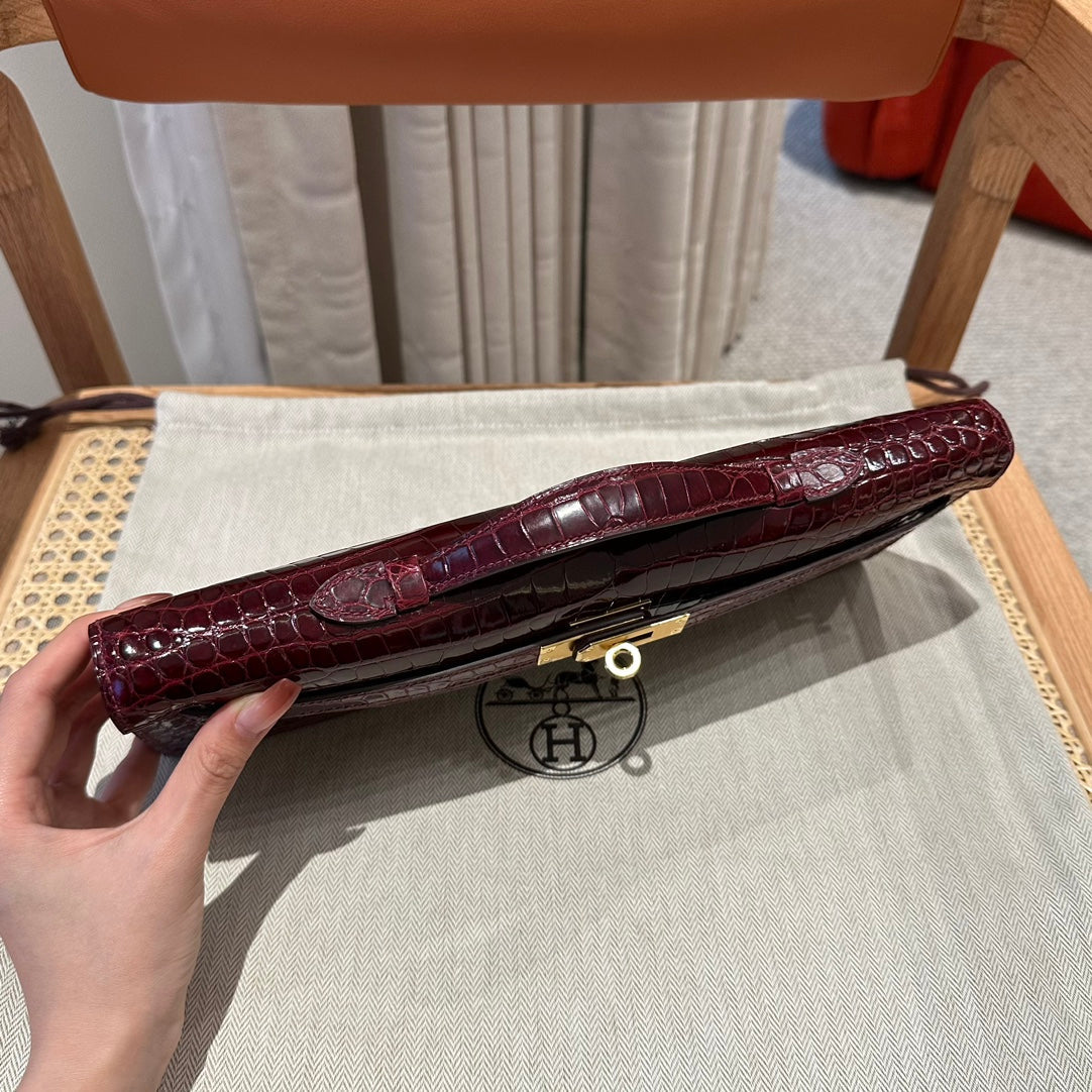 KELLY CUT 31 IN SANGRIA PURPLE ALLIGATOR LEATHER WITH GOLD HARDWARE (MADE-TO-ODER)