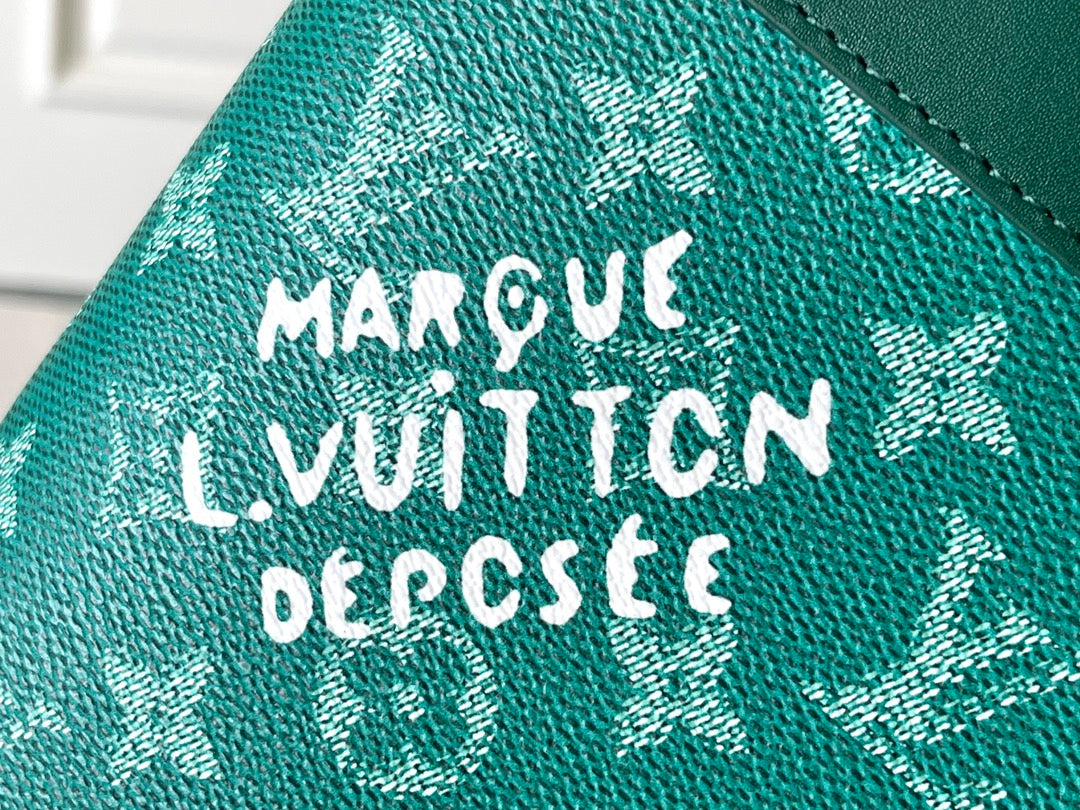 POCHETTE VOYAGE SOUPLE 32 AUS GRÜNEM MONOGRAM-HERITAGE-CANVAS