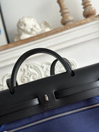 ZIP CABINE 31 BAG IN NAVY BLUE CANVAS AND BLACK CALFSKIN