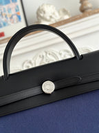 ZIP CABINE 31 BAG IN NAVY BLUE CANVAS AND BLACK CALFSKIN