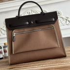ZIP CABINE 31 BAG IN CHOCOLATE BROWN CANVAS AND BLACK CALFSKIN