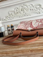 HERBAG ZIP 31 RETOURNE PEGASE POP BAG IN OFF-WHITE MIX RED CANVAS AND HUNTER COWHIDE