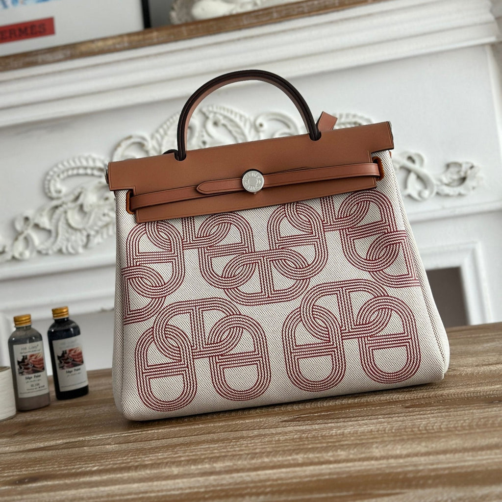 HERBAG ZIP 31 LAQUERED BAG IN OFF-WHITE MIX RED H PLUME CANVAS