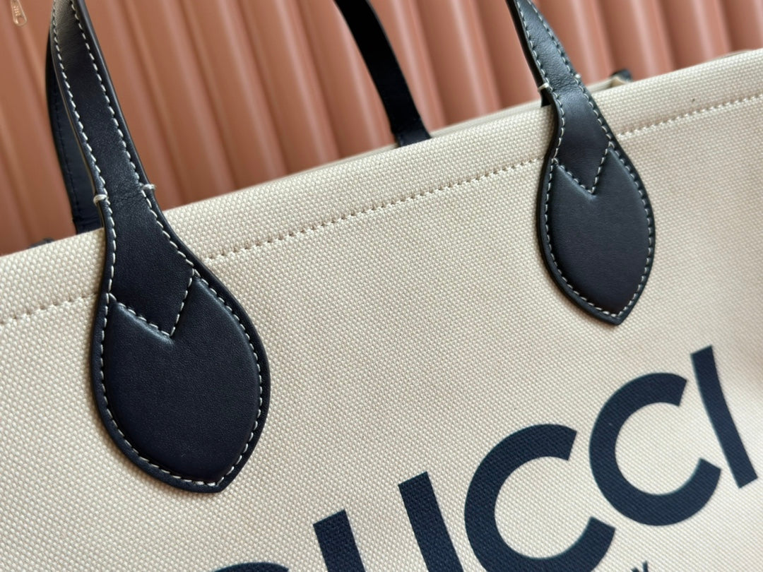 TOTE BAG PRINTED LOGO 41.5 IN WHITE CANVAS DARK BLUE CALFSKIN