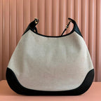 BODY MEDIUM SHOULDER BAD 49 IN NATURAL CANVAS AND BLACK CALFLEDER GOLD HARDWARE