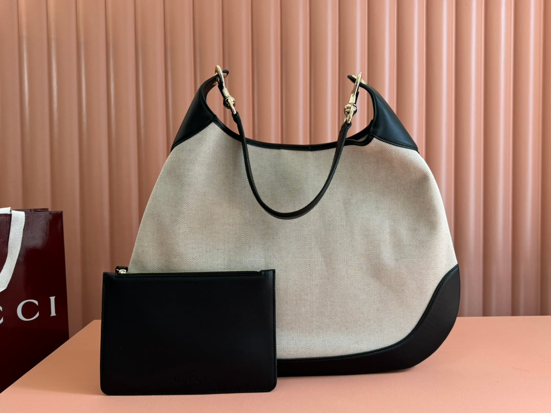 BODY MEDIUM SHOULDER BAD 49 IN NATURAL CANVAS AND BLACK CALFLEDER GOLD HARDWARE