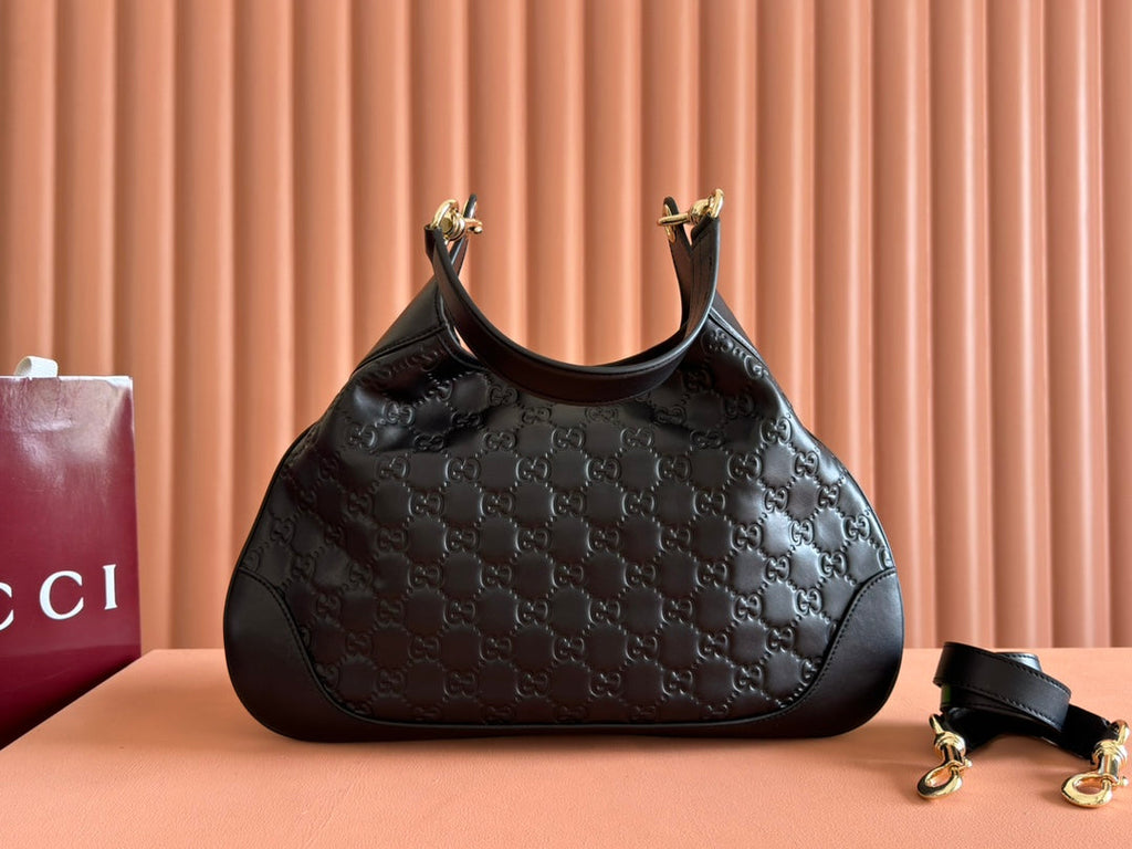 MEDIUM B SHOULDER BAG IN BLACK CALFSKIN GOLD HARDWARE