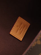 POCHETTE CAMILLE TASCHE 20 IN BRAUN MONOGRAMM BESCHICHTETES CANVAS