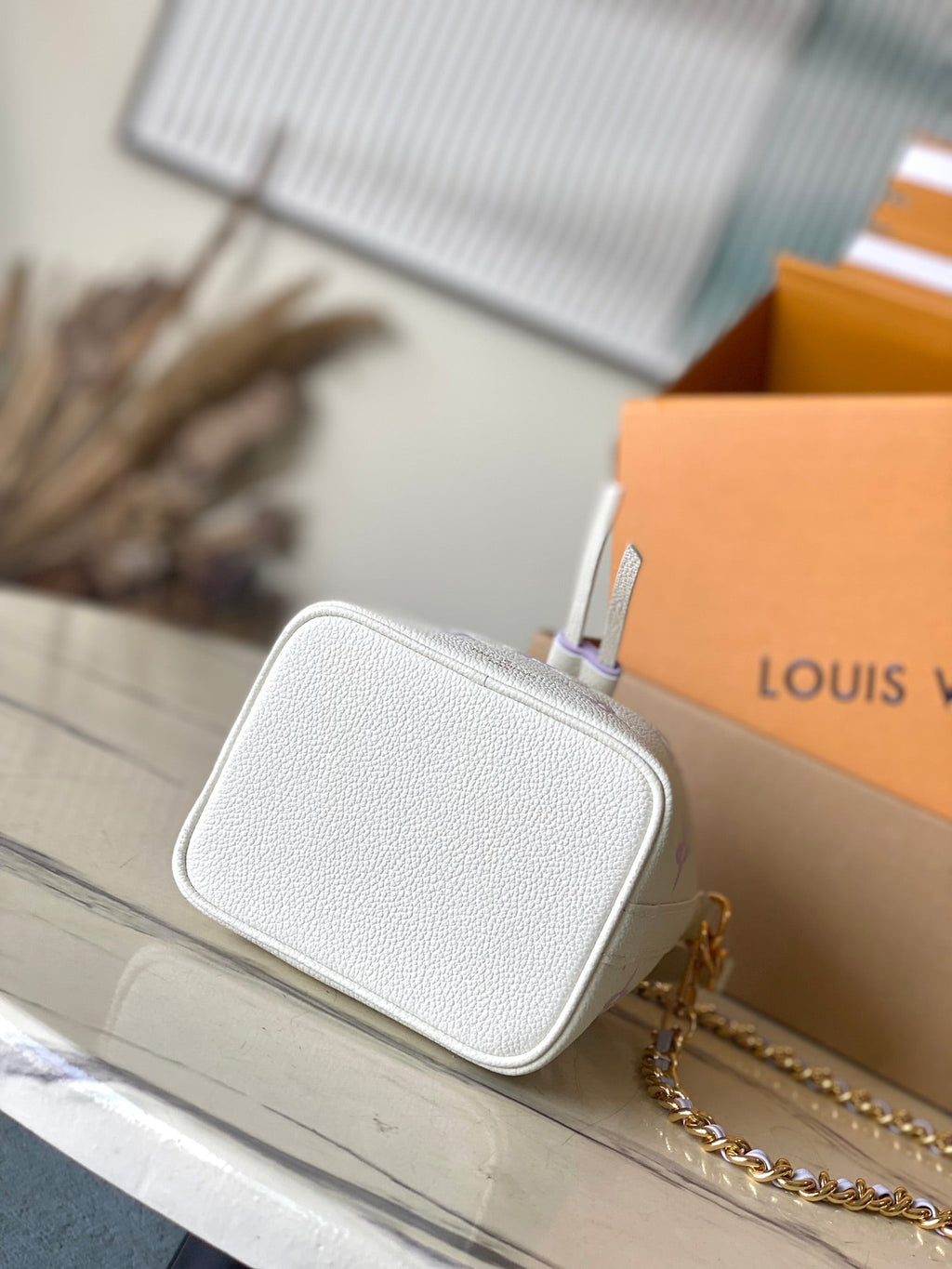 NANO NOÉ 16 IN WHITE PURPLE MONOGRAM EMBOSSED CALFSKIN