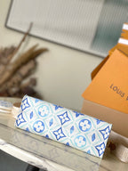 ONTHEGO EAST WEST 25 IN LAGOON BLUE MONOGRAM TILES CANVAS