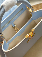CAPUCINES BB 26 IN CANDY BLUE TAURILLON GOLD HARDWARE