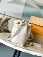 Bundle 28 in Weiß-Orange Monogramm Empreinte Leder Gold Hardware