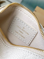 Bundle 28 in Weiß-Orange Monogramm Empreinte Leder Gold Hardware