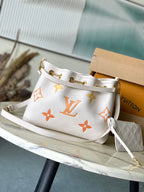 Bundle 28 in Weiß-Orange Monogramm Empreinte Leder Gold Hardware